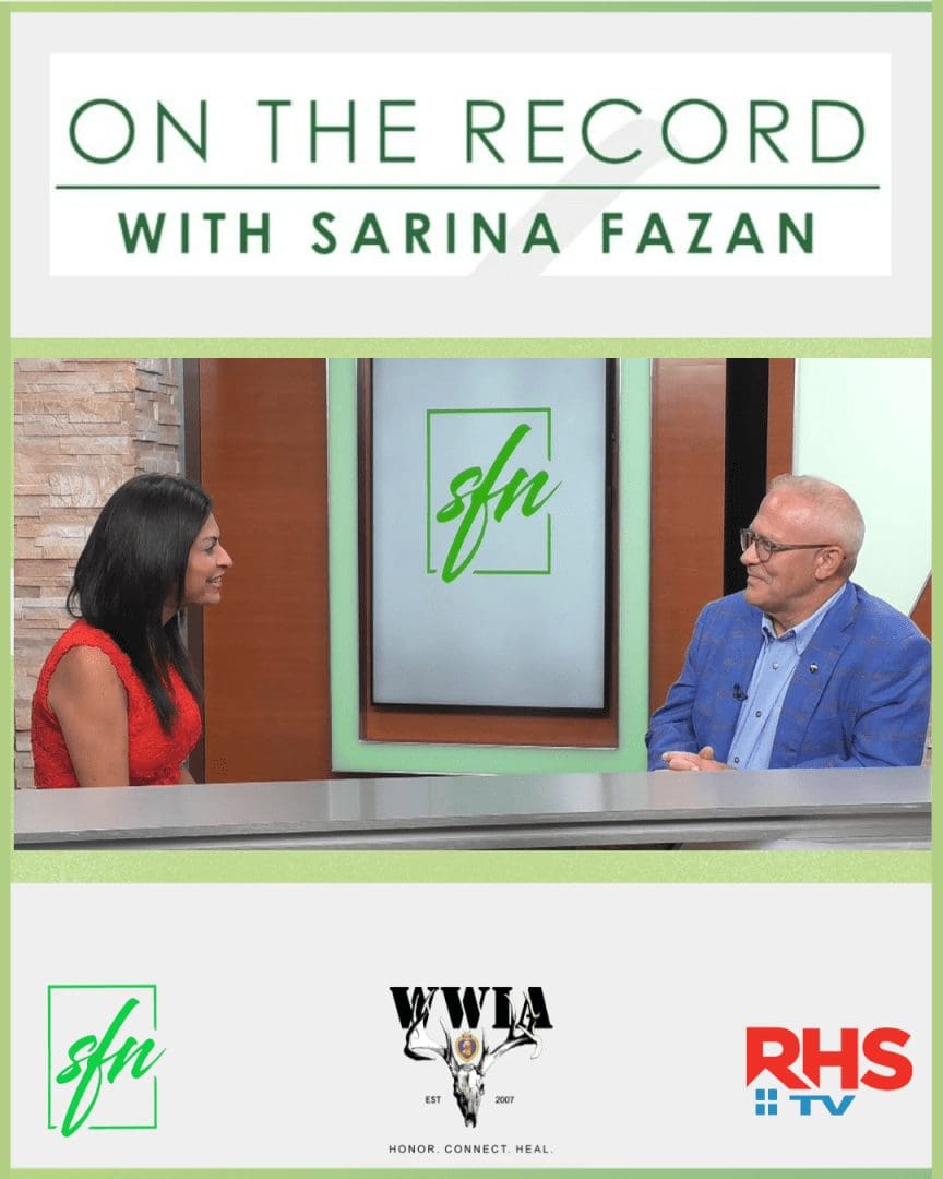 Talk show interview with two people seated