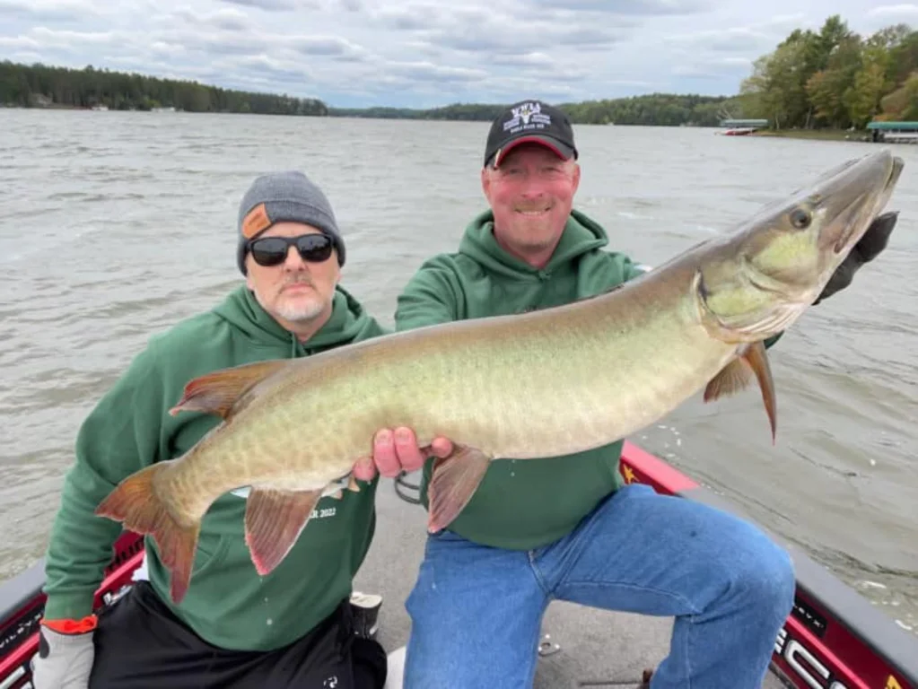 Anglers proudly showing a huge muskellunge Wounded Warriors in Action Foundation Anglers proudly showing a huge muskellunge