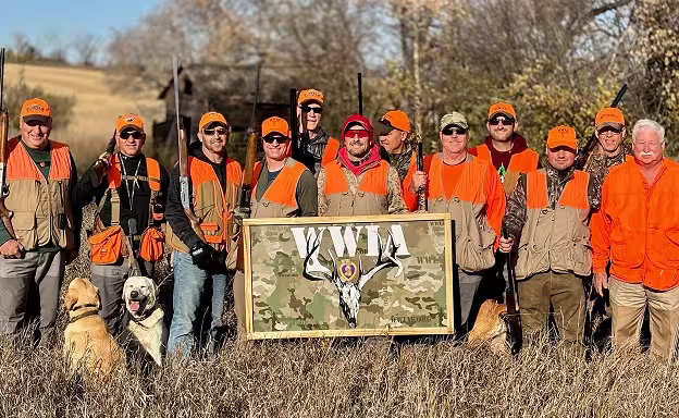 wounded warriors members posing for a group photo