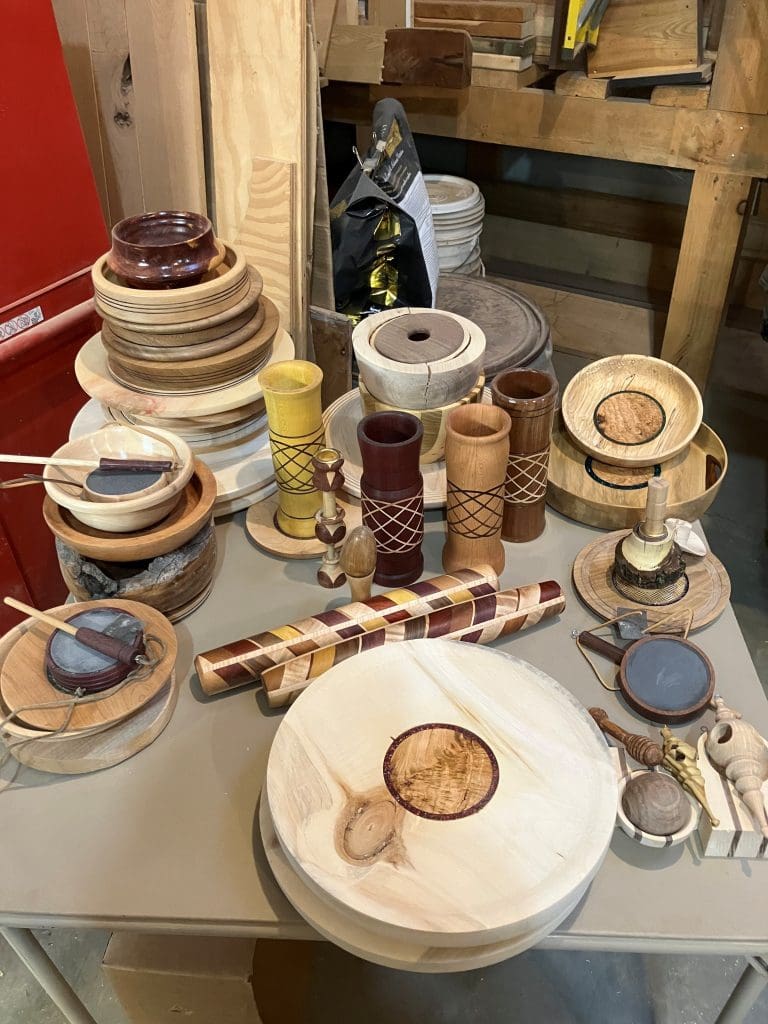 Wooden crafts and bowls displayed on table Wounded Warriors in Action Foundation Wooden crafts and bowls displayed on table
