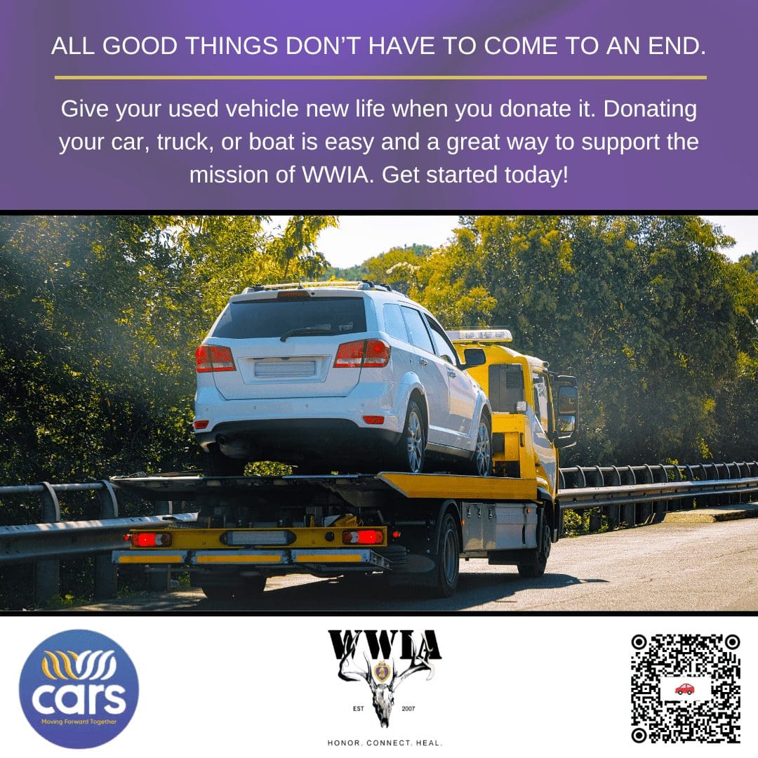 Tow truck carrying a white car