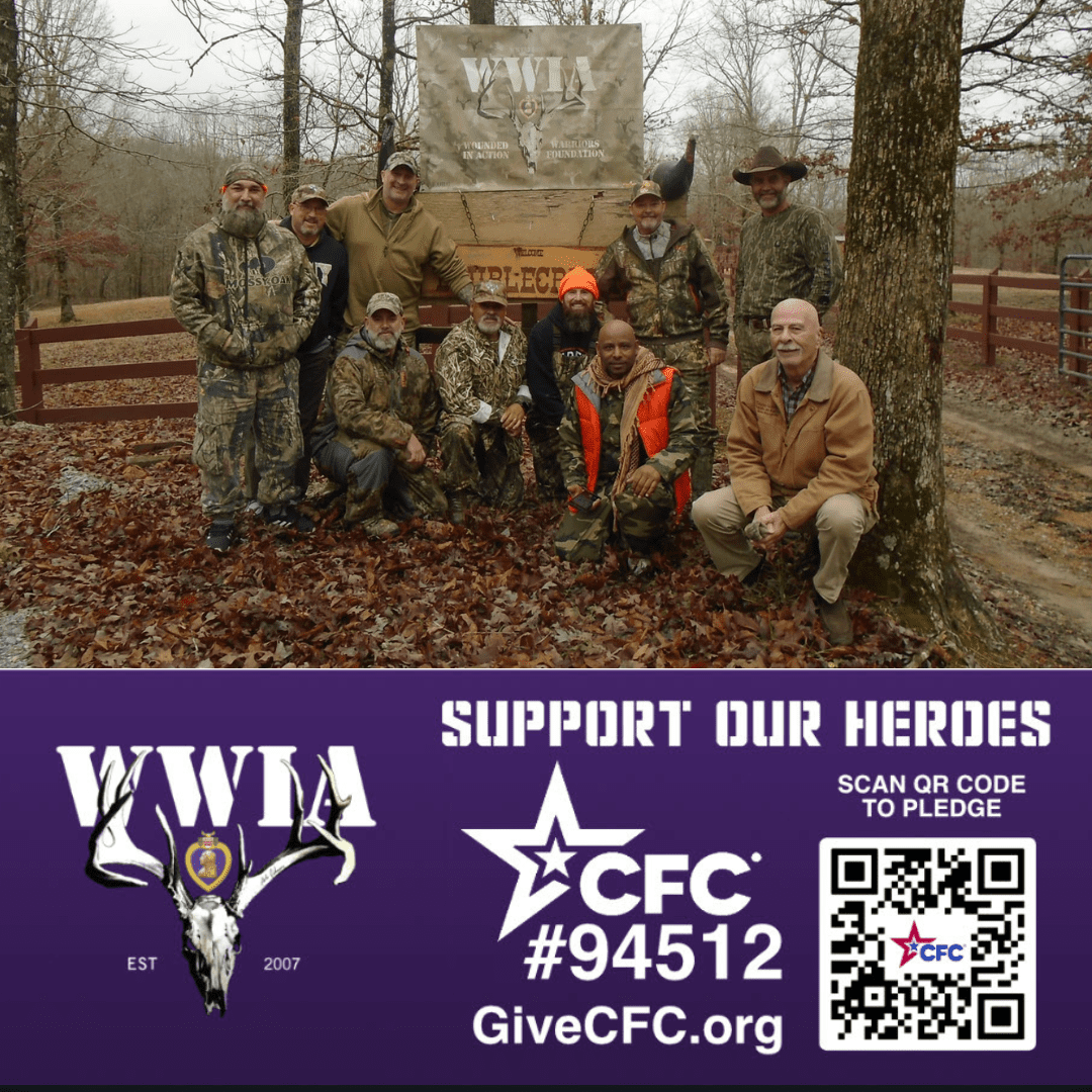 Group of people outdoors WWIA sign visible